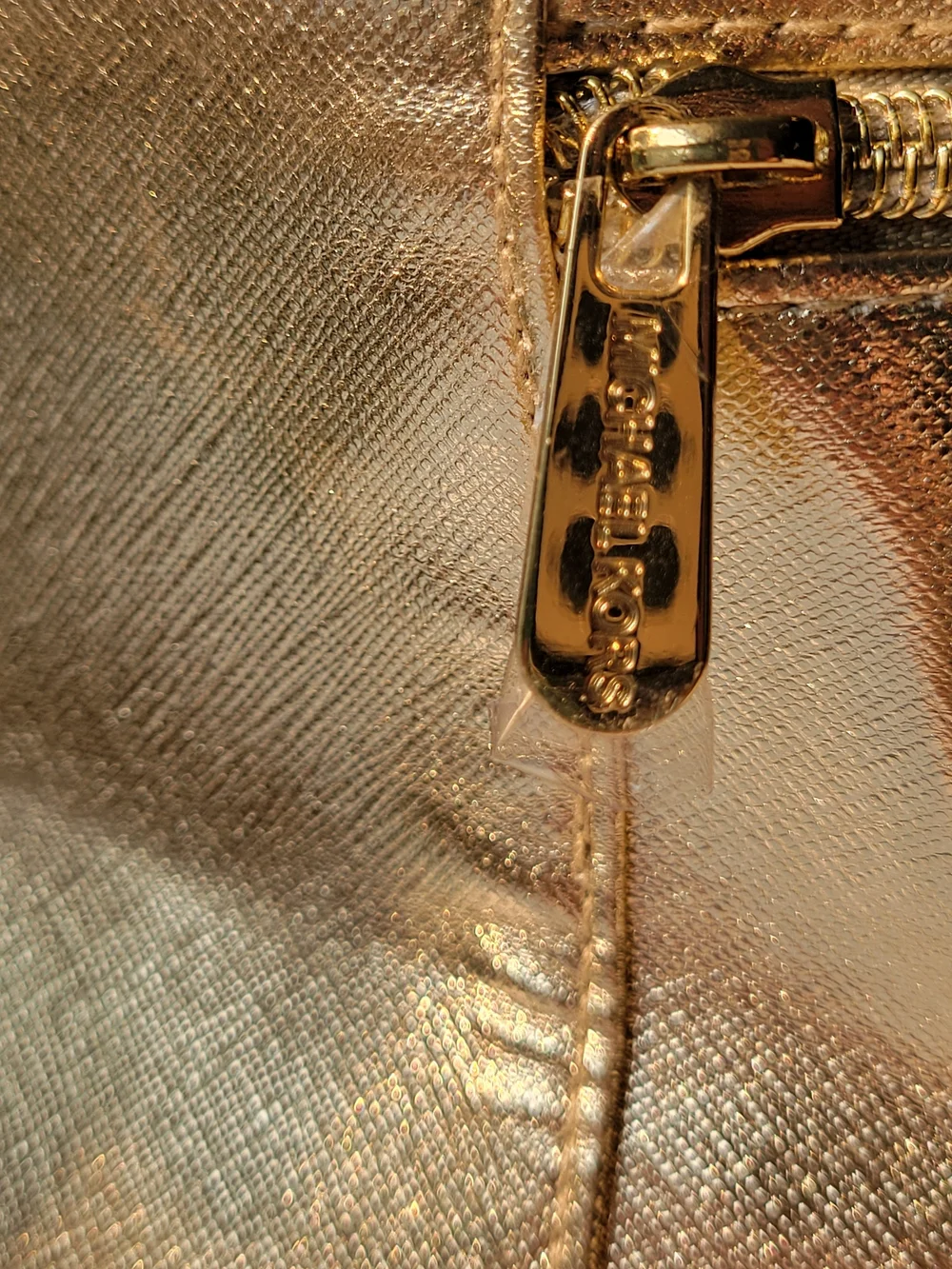Michael Kors Metallic Cosmetic Case & 5 Piece Cherry Bag Charm Bundle